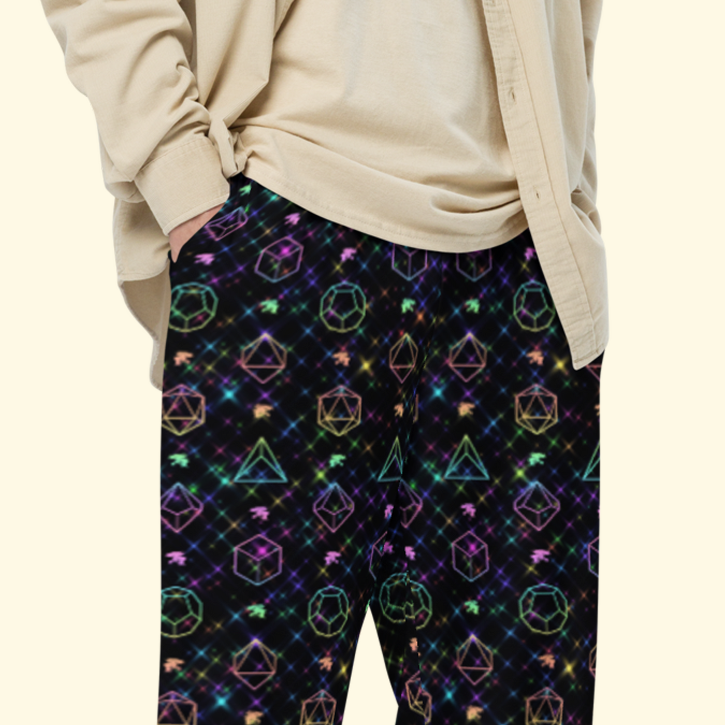 Close-up of Rainbow D&D Dice Wide-Leg Pants showing colorful dice and dragon print